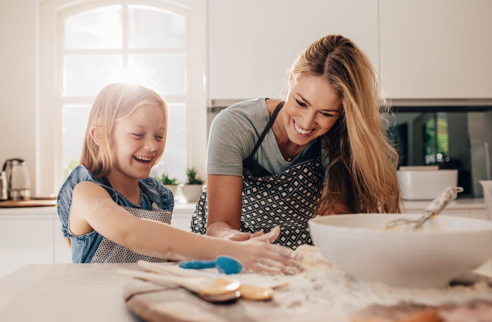 Woman and child cooking together